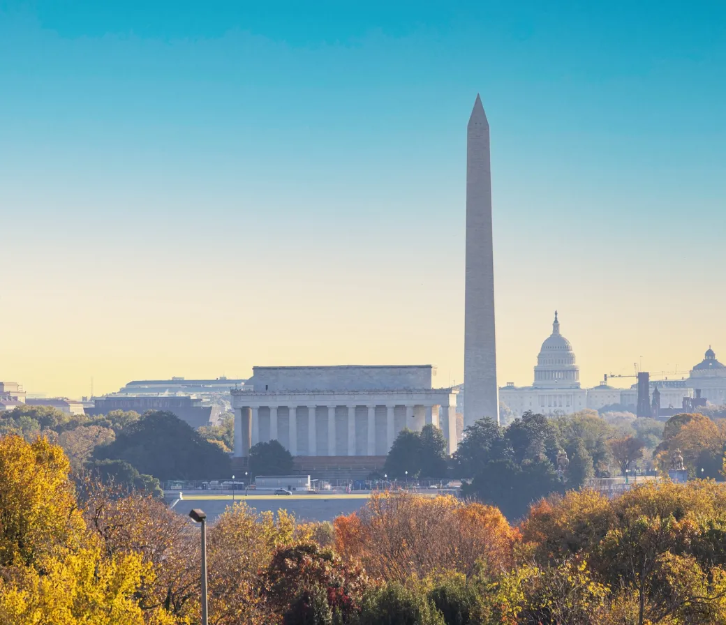 Cityscape panorama of Washington DC skyline with Lincoln Memorial and Washington Monument (Image via Shutterstock)