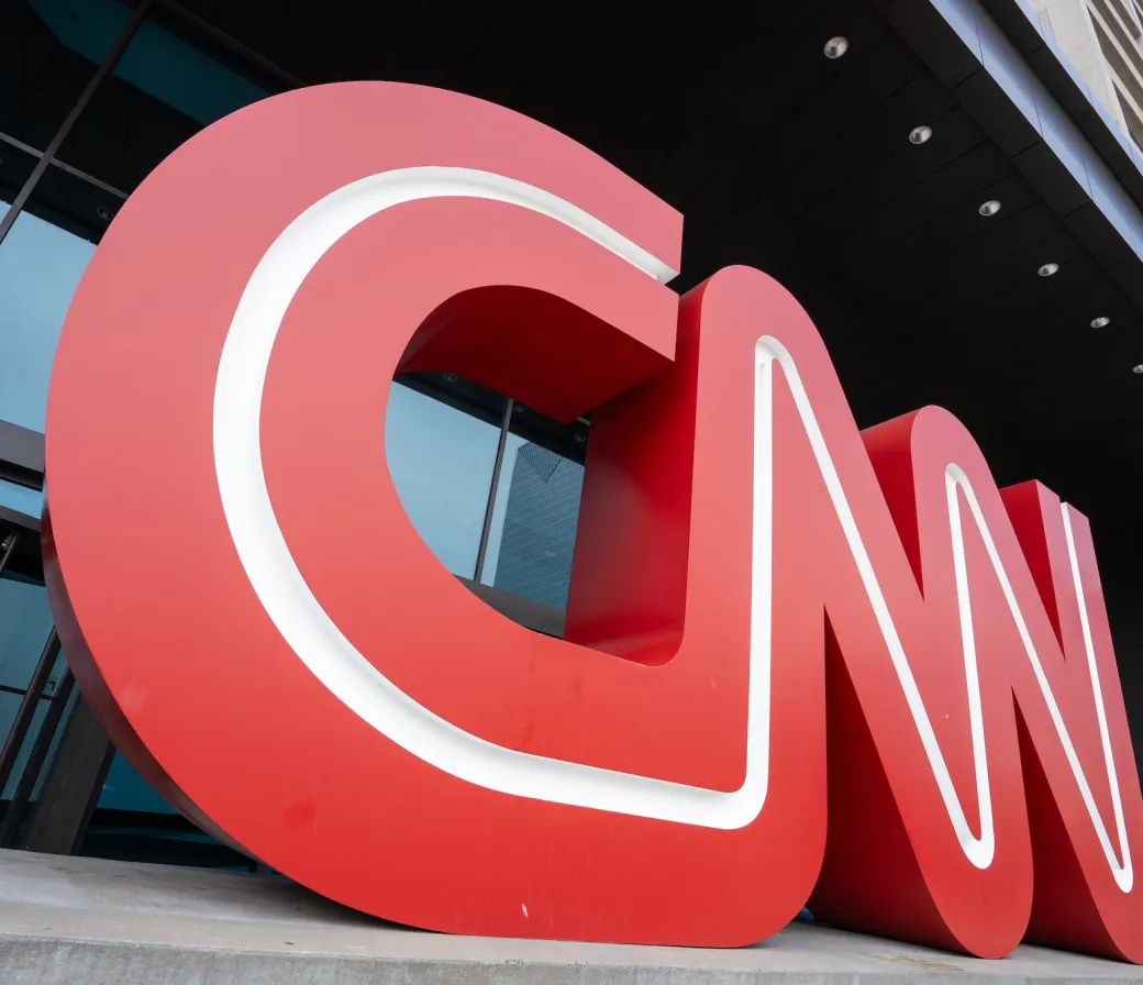 Closeup of the giant CNN logo seen at the main entrance to the CNN Center in Atlanta, Georgia. (Image via Shutterstock.com)