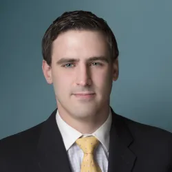 Headshot of Ari Cohn