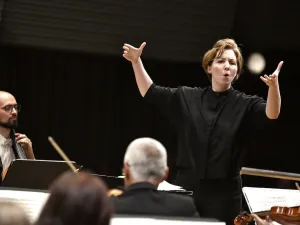 Rebecca Bryant Novak conducting an orchestra
