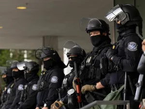 Los Angeles, California, USA - June 10, 2025: U.S. Customs and Border Protection (CBP) field officers guard a federal building during ICE deportation protests in Downtown LA. 