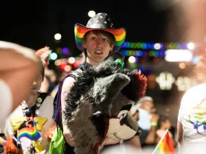 Participants at the 2024 Pride Bigger Than Texas Night parade.