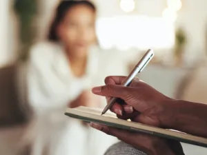 Therapist taking notes