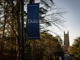 Duke University banner with admissions building in background