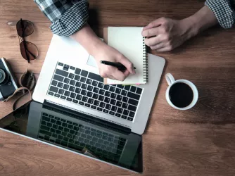 College student drinking coffee laptop