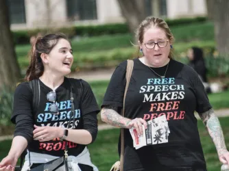 FIRE passing out flyers on campus in 2025