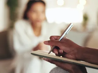 Therapist taking notes