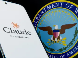 Claude by Anthropic Logo on Smartphone with US Department of War Seal (Image via Shutterstock.com)