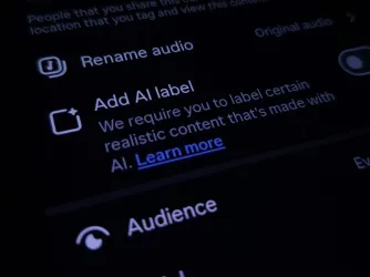 Close up image of Instagram on a smartphone with "Add AI Label" to ensure transparency on created content. (Image via Shutterstock.com)