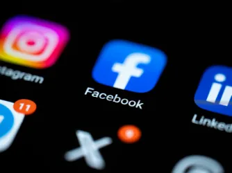 Social media app icons on an Android phone (Image via Shutterstock.com
