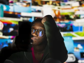 student using social media