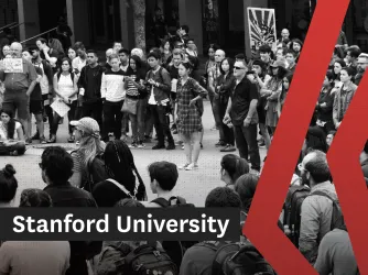 Black and white photo showing students and faculty protesting on a college lawn.