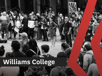 Black and white photo showing students and faculty protesting on a college lawn.