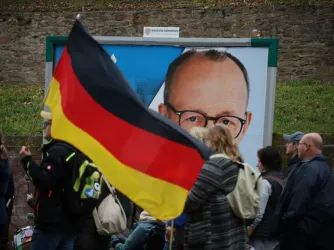 People wave German flag in support of AfD