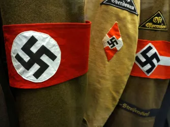 Nazi uniforms on a rack