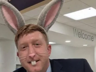 Wolverhampton Tory councillor Simon Bennett, wearing AI-generated bunny ears, whiskers, and teeth.