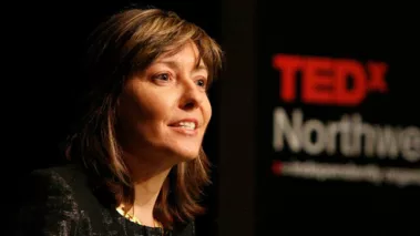 Alice Dreger speking at a TEDx event.