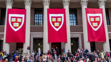Students of Harvard University gather for graduation ceremonies on Commencement Day in Cambridge, MA.