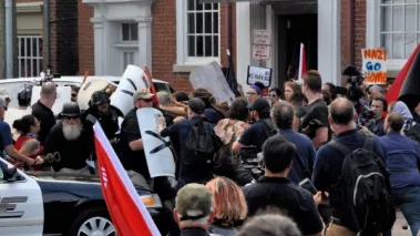 White nationalists and counter-protesters clash during the "Unite the Right" rally in Charlottesville, Virginia on August 12, 2017. 