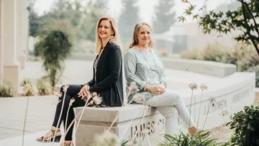 Yosemite Community College District trustees Leslie Beggs and Anne DeMartini on the campus of Modesto Junior College