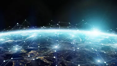 Computer illustration of the sun rising over the curvature of the earth in outer space