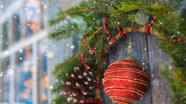 Christmas wreath on a door with a bump and a ball horizontal