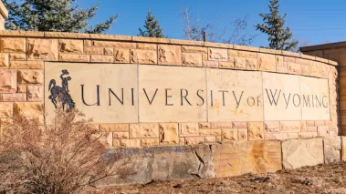 Stone University of Wyoming sign outside of the university campus in Laramie