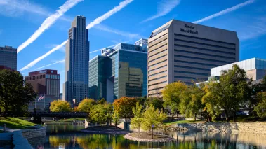 An evening view of the Omaha, Nebraska skyline from the Gene Leahy Mall.