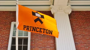 Princeton University orange flag flying on campus
