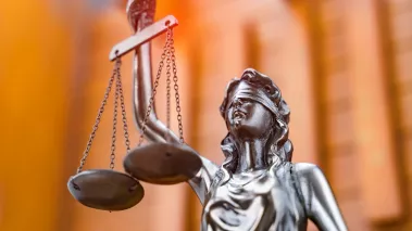 Statue of Justice holding scales