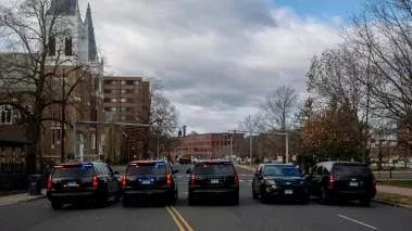 Police cars block a roadway in Hartford, Connecticut