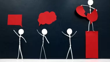 Human stick figure tearing down red speech bubble.