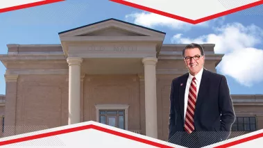 West Texas A&M University President Walter Wendler standing in front of the Old Main building