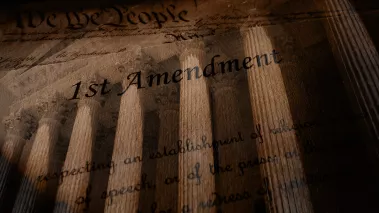 First Amendment text of the United States Constitution over the Supreme Court building