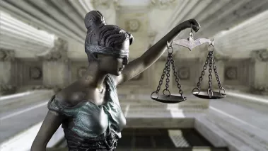 Lady Justice isolated on Front Columns of the Supreme Court