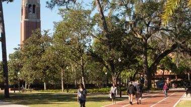 Students walking around in the Plaza of the Americas at the University of Florida