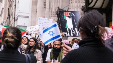 Pro-Israeli and pro-Palestinian protesters gather in front of the CUNY grad center in New York city.