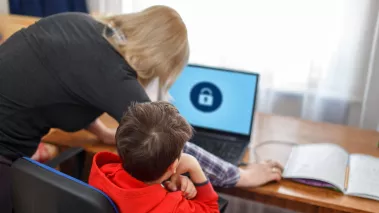Mother locking on computer for son, parental control