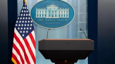 The White House press room and podium with the American flag