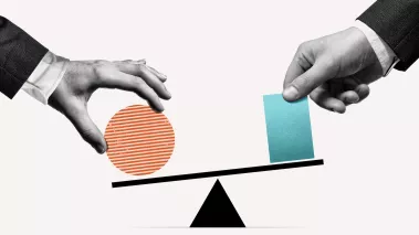 Two hands putting weights on a balance scale