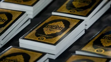 Qurans on a table at an Eid Celebration and Friday Prayer at the Texas state Capitol on Friday April 19, 2024