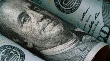 Closeup of Benjamin Franklin face on $100 bill