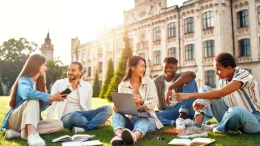 College students engage in academic discussions outdoors on campus