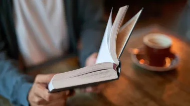 Student reading book