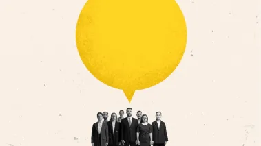 A small group of people with a yellow speech bubble over their heads