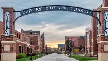 Entrance gate at dusk at the University of North Dakota in Grand Forks