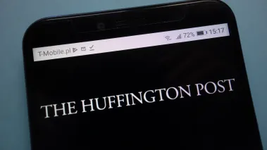 Huffington Post logo displayed on smartphone (Image via Shutterstock.com)