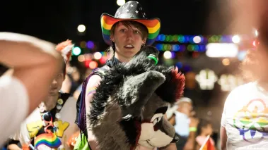 Participants at the 2024 Pride Bigger Than Texas Night parade.