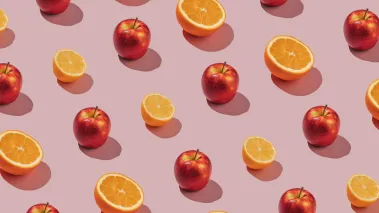 Pattern made of fresh apples and oranges concept (Image via Shutterstock.com)