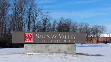 Sign for Saginaw Valley State University a public university in Michigan (Image via Shutterstock.com)